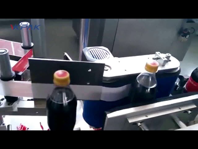 Automatisk merkemaskin for colaflasker